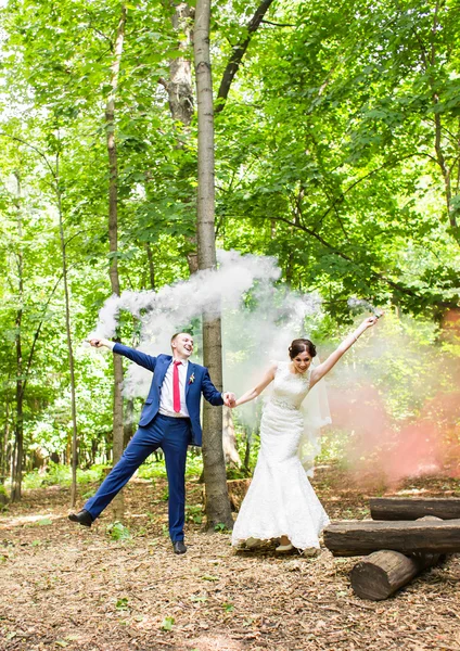 Wedding couple having fun and walk in the park