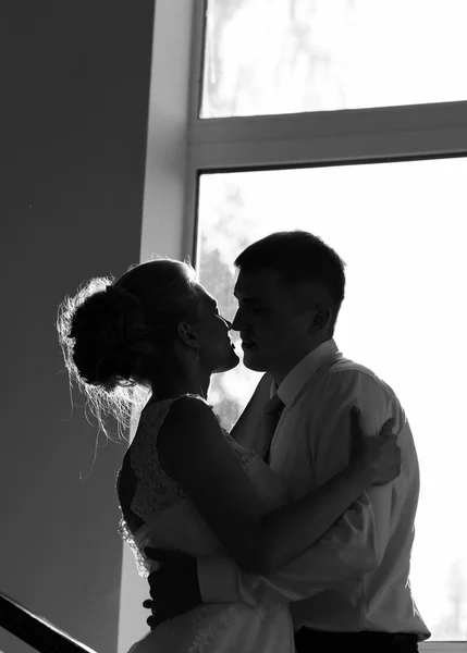 Silhouette couple kissing