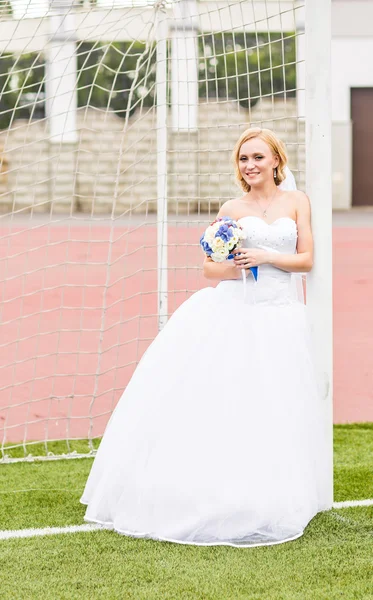 European Football Championship concept. Bride on the football stadium.