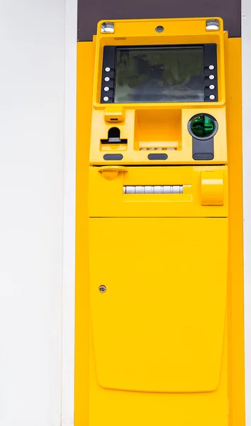Yellow ATM machine