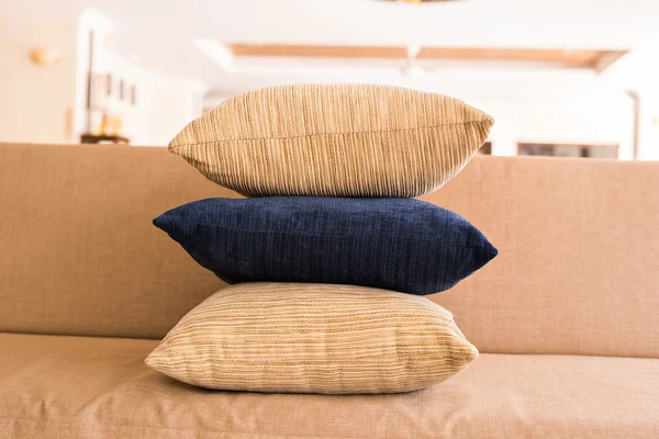 Cozy sofa with pillows. Living room interior and home decor concept