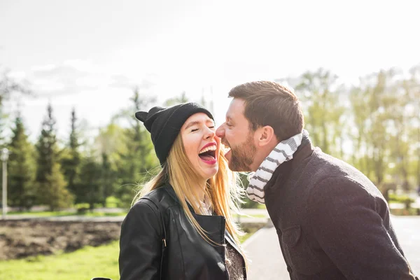 Happy couple having fun and fooling around. Joyful man with woman have nice time. Good relationship.