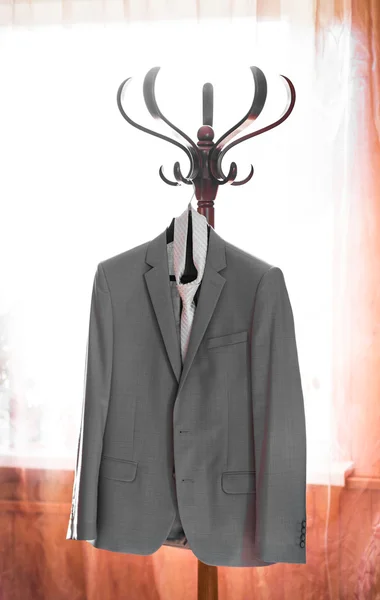 Suit and tie on hanger