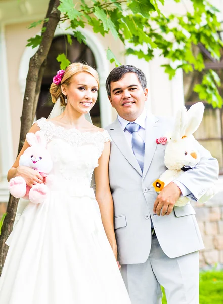 Wedding couple with wedding  toys, bunnies, rabbits