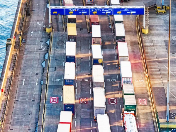 Line of Trucks in Port
