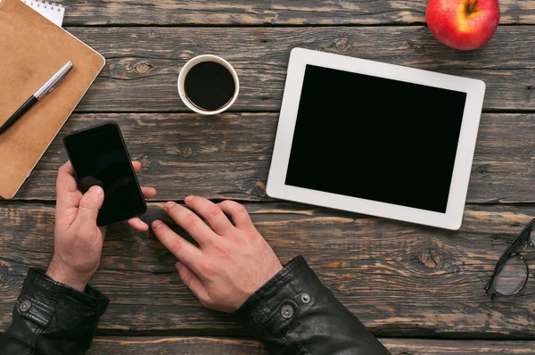 Man is working with the help of digital device