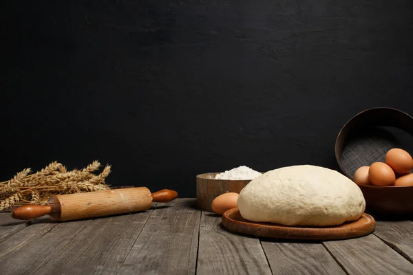 Dough on table with space for an object in bakery