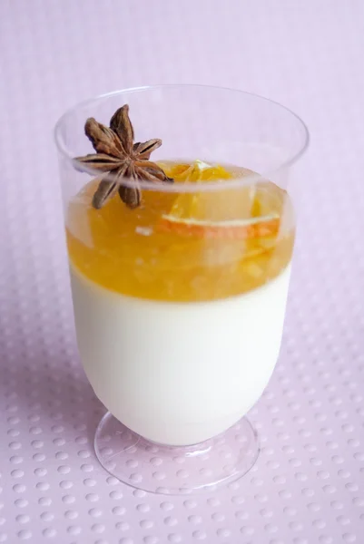 Tiramisu dessert with jelly and a piece of orange