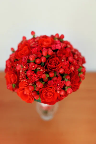 Flower decoration in wedding day. Red roses and berries