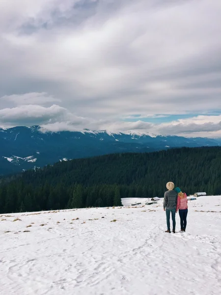 Couple in love traveling in the mountains