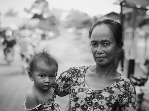 Woman with her daughter, Laos