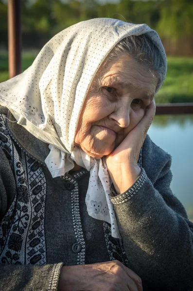 Grandmother walks in park