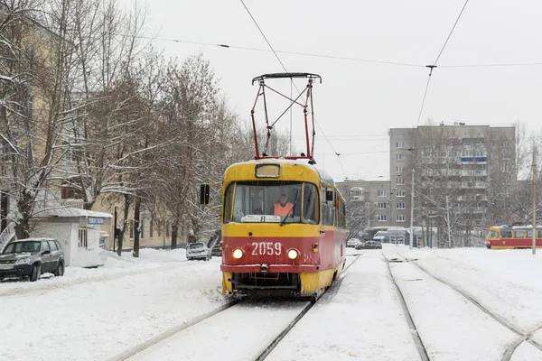 Yellow Winter Tram and Snow in Russian Winter