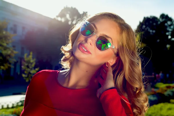 Fashion close up Portrait of young blonde woman.