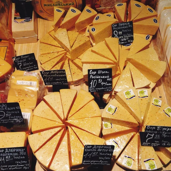 Assortment of cheese in shop