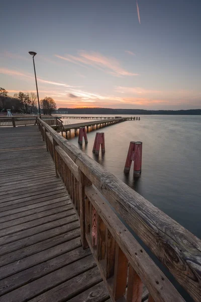Lake landscape with jetty. Long time exposure