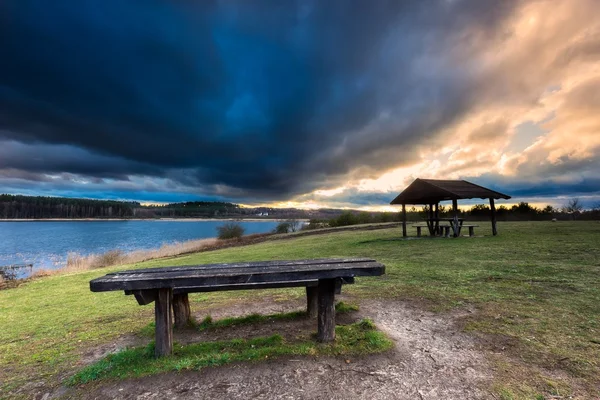 Landscape with wooden hut.