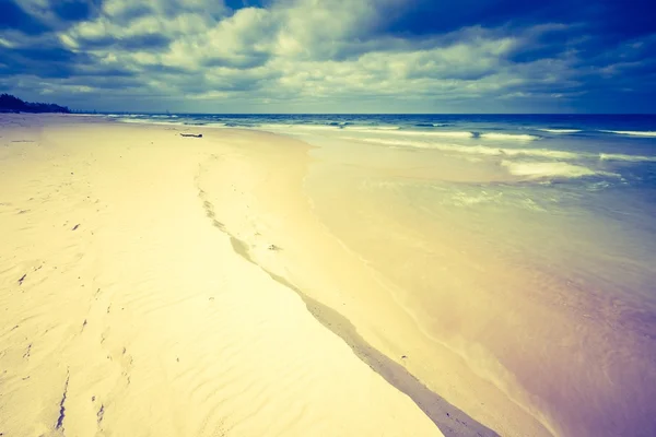 Beautiful beach with cloudy sky