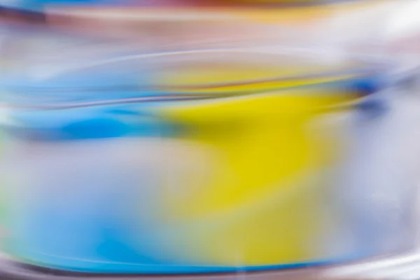 Abstract background of color reflections in glass