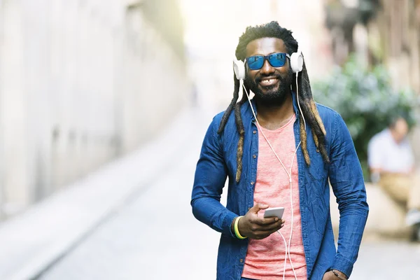 African Young Man Listening Music