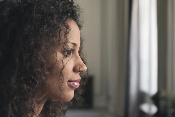 Beauty portrait of pretty young mulatto woman with beautiful mak