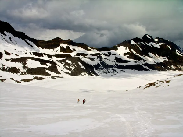 Mountains alps snow people walking on glacier