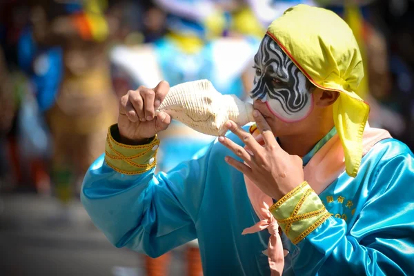 Chinese art guy with seashell