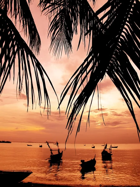 There is peaceful place, bangsean in the evenning, bangsean chonburi thailand, relax on the beach, fishing boat on the beach, wooden boat on the ocean, rural life in thailand, sky in the evening, coco