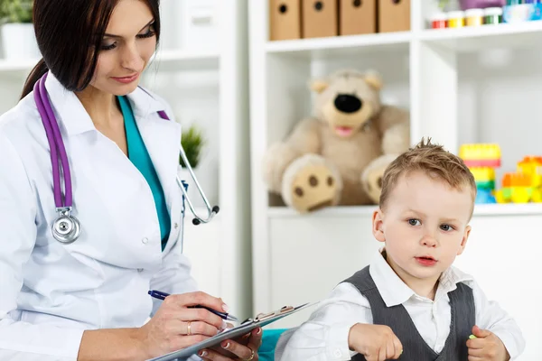 Pediatrician communicating with patient
