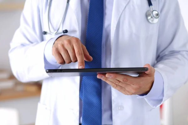 Male medicine doctor holding digital tablet pc