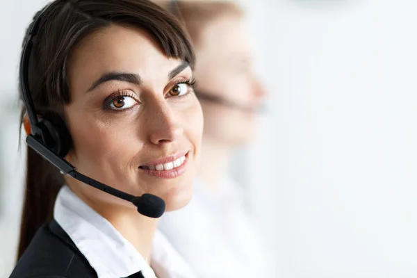 Female call center service operator at work