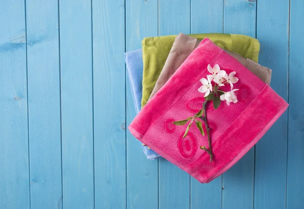 Colored towels and flowers