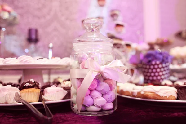 Mix of wedding sweets on table