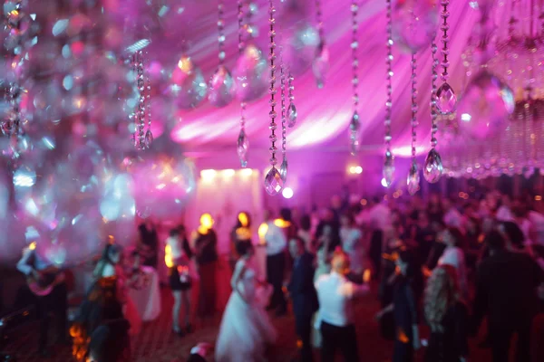 Elegant crystals hanging above wedding reception