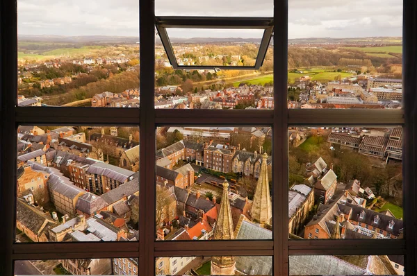 Open window to see top view of Durham city. This picture was taken on Durham tower which is a part of Durham Cathedral, England.