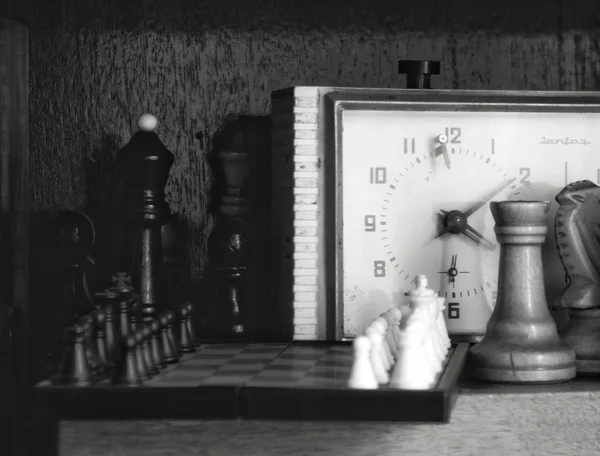 Chess clock with chess pieces