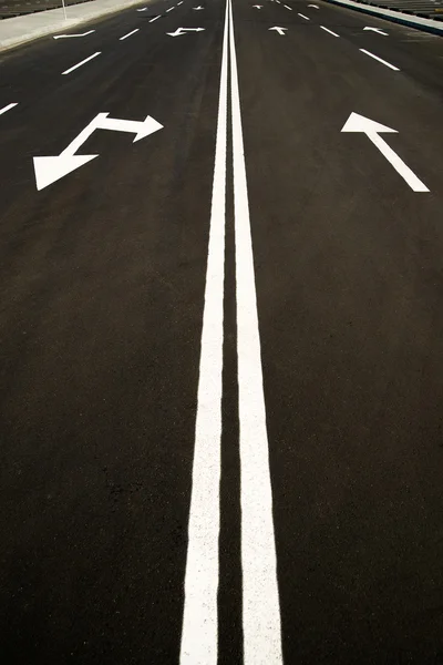 Road markings on the asphalt road in the city