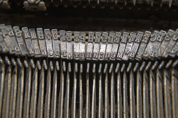 Metal parts for printing on an old typewriter