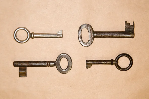 A lot vintage keys from the locks on craft paper