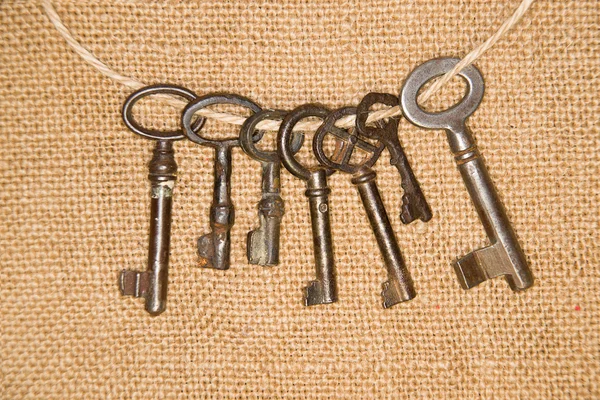 A lot vintage keys from the locks on old cloth