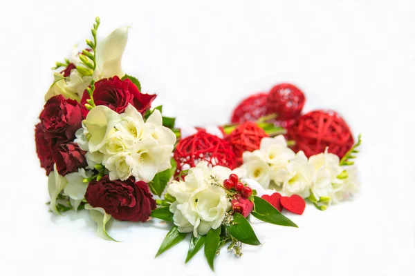Wedding bouquet with red roses, a buttonhole and bracelets