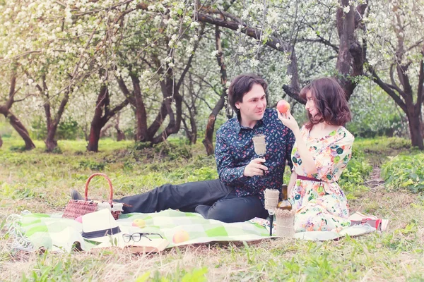 Spring landscape couple in love outdoor tree picnic