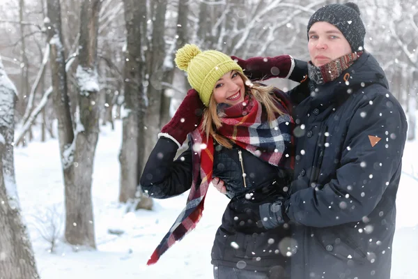 Couple in love street winter snow