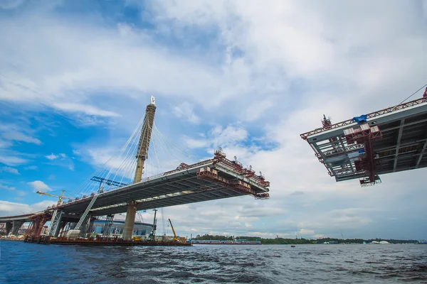 Beautiful cable-stayed bridge in the construction process. summe