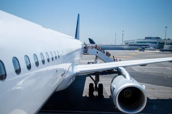 Unidentified group of people walked to Nok Air airplane