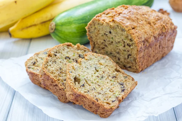 Loaf of homemade banana zucchini bread with walnuts