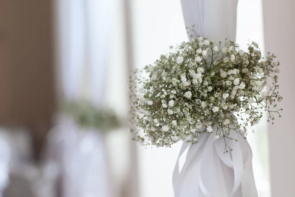 Decoration of wild flowers on the curtains