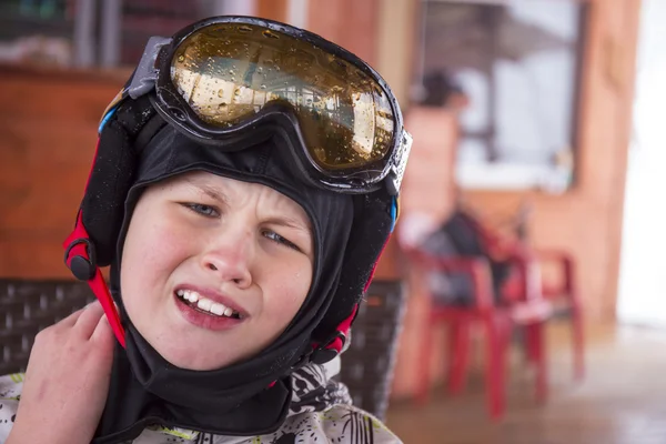 Portrait of a boy in ski helmet and protective glasses