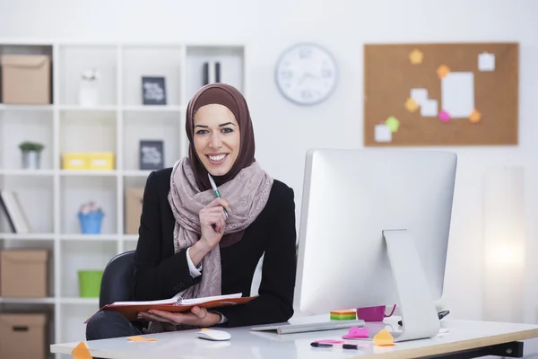 Arabian business woman in office
