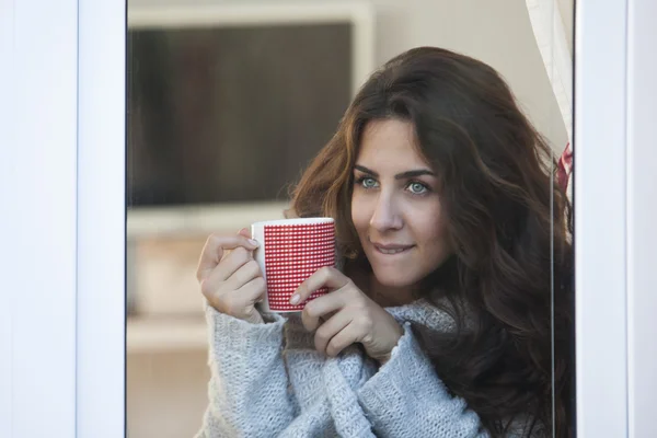 Woman drinking coffee